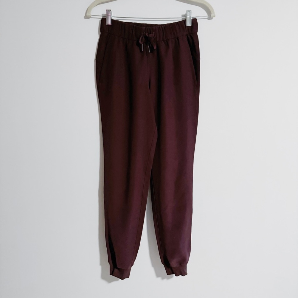 Lululemon - Burgundy On The Fly Woven Jogger Pants